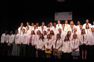 52 student doctors of podiatric medicine receive white coats at Barry University
